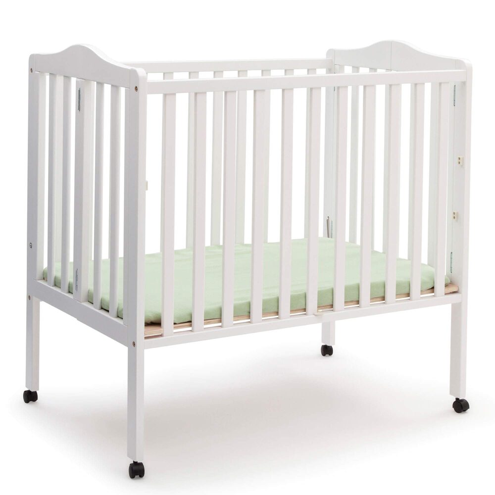 Delta Children Folding Portable Mini Baby Crib with Mattress - White